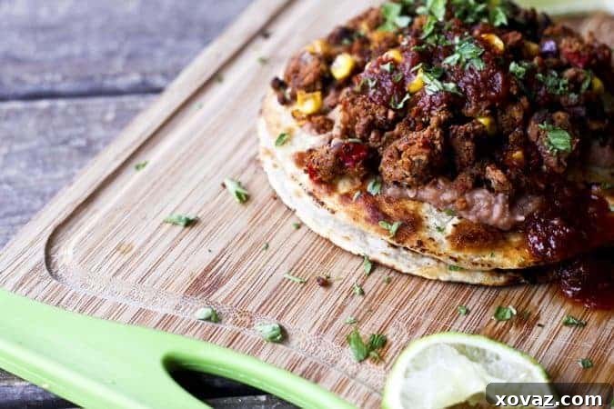 Delicious Vegan Double Stack Bean and Meatless Crumble Tostadas | Easy Plant-Based Family Meal