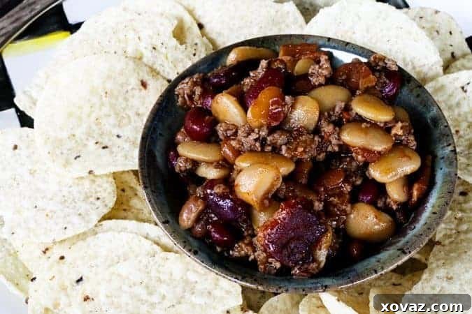 Hearty Calico Beef Bacon Bean Bake 3 Close-up of bubbling Calico Beans casserole with beef, bacon, and beans