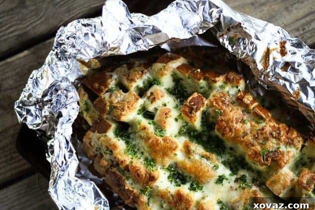 60 Ultimate Game Day Snacks 4 Cheddar Tailgating Bread, a cheesy, garlicky pull-apart bread perfect for Game Day sharing.