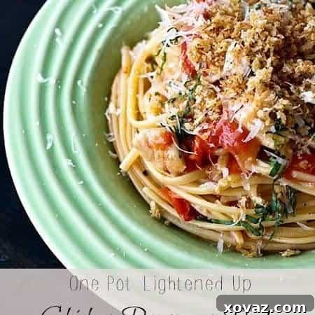 One-Pot Lightened Up Chicken Parmesan Pasta in a serving bowl