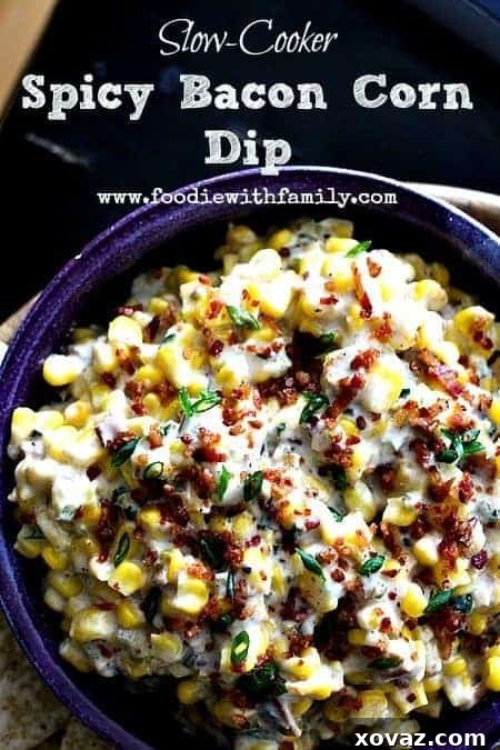 Creamy, cheesy slow cooker spicy bacon corn dip garnished with fresh green onions and crispy bacon bits, served in a rustic bowl with crunchy tortilla chips.