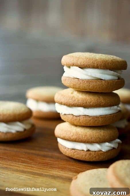 Delicious Fiori di Sicilia Buttercream sandwiched between two sugar cookies, creating a perfect dessert.