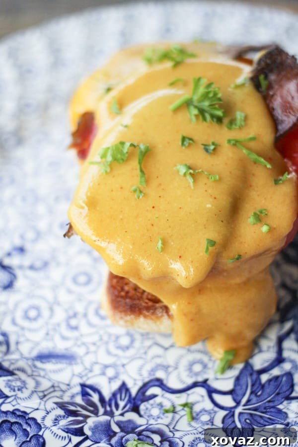 Ingredients for making Welsh Rarebit sauce, including sharp cheddar cheese, beer, mustard, and butter.