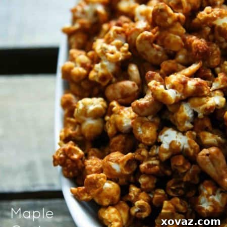 Maple Cashew Caramel Delight 4 A close-up of delicious Cashew Maple Caramel Corn with cashews, ready to be enjoyed.