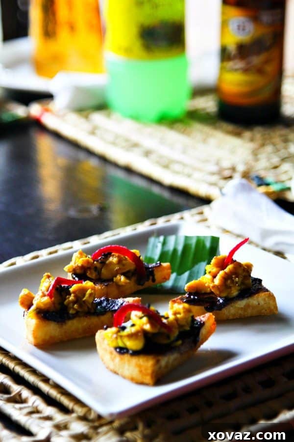 Jah Know (crispy bammy cake with curied ackee and banana chutney) at Miss T's in Ocho Rios, Jamaica sailing on the #CarnivalBreeze #Client - A must-try national dish on your Caribbean cruise.