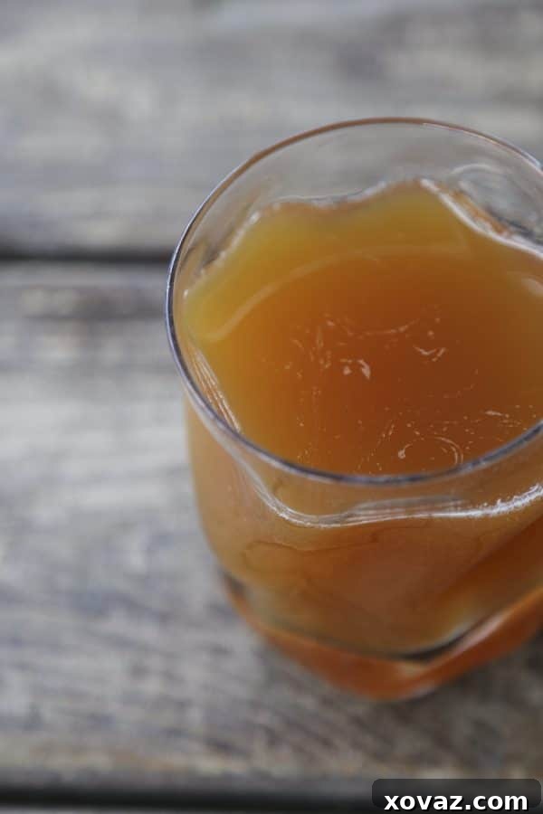 Hot Maple Bourbon Apple Cider without whipped cream, showing the rich amber color of the drink