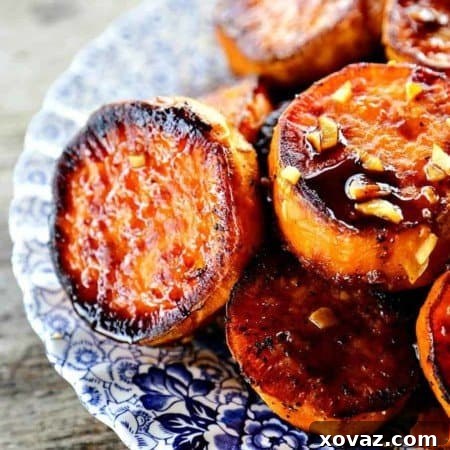 Melting Sweet Potatoes: Deeply caramelized, flavorful slices of sweet potatoes so tender they yield to the edge of a spoon, creating a truly irresistible side dish.