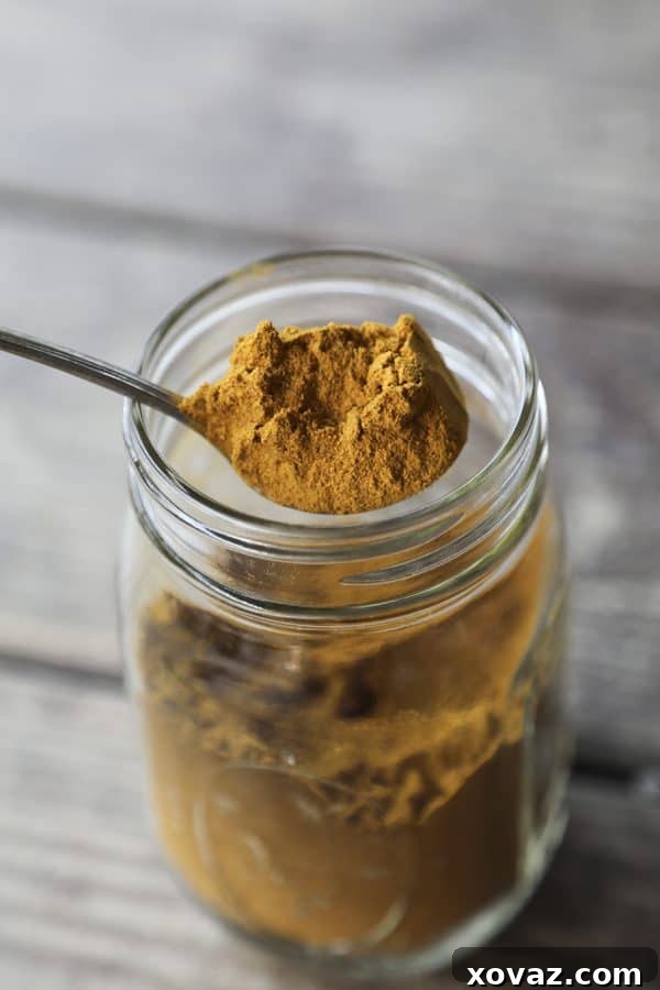 A serene image of Golden Honey Milk in a clear mug, steam gently rising, set against a cozy backdrop – the perfect calming evening drink.