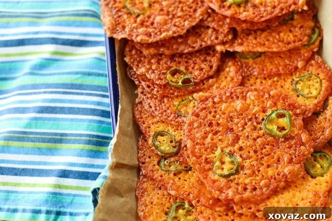 Cracklingly crisp, spicy 2-Ingredient Jalapeño Popper Crisps are a fabulously simple cracker for soups, stews, and salads. Bonus: They're low-carb, too!