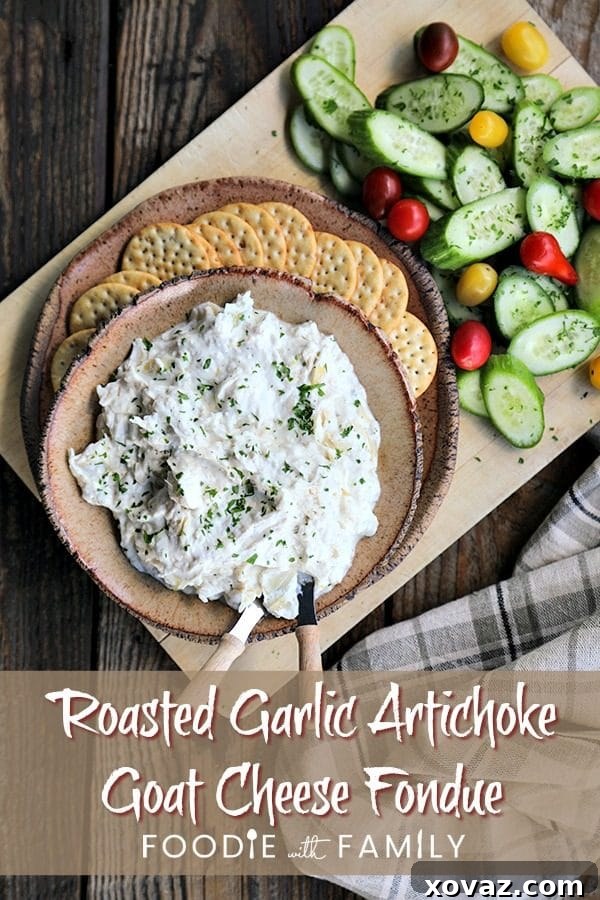Velvety Roasted Garlic Artichoke Goat Cheese Dip 7 A serving of Roasted Garlic Artichoke Goat Cheese Fondue, garnished and ready for a party.
