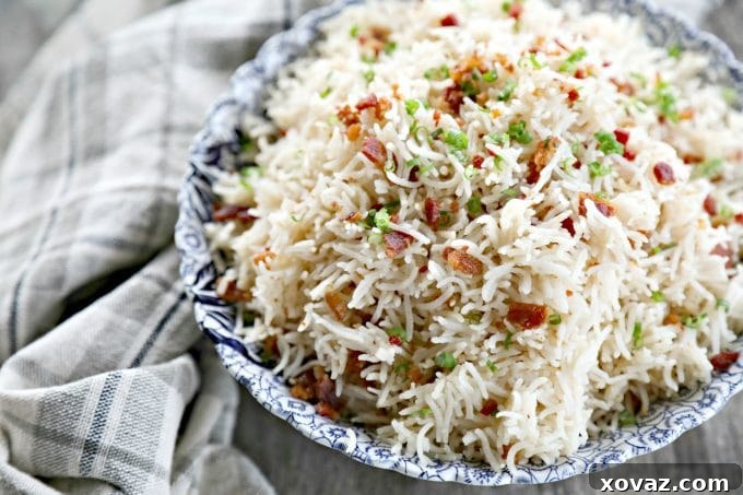 Delicious Bacon Garlic Rice, featuring tender basmati grains infused with crispy bacon, aromatic fried garlic, and fresh green onions. A flavor explosion perfect with grilled meats or as a midnight snack.
