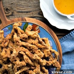 These Easy Crispy Pork Tenders or Pork Fries will be your new go-to snack. Make a huge pile of irresistible crispy-breaded pork from just two New York (boneless center cut) pork chops.