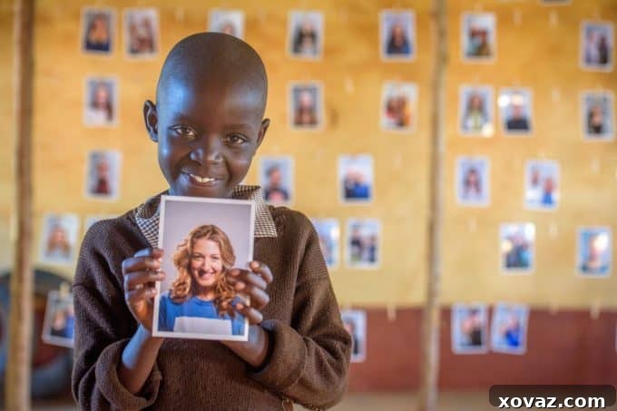 Children in a World Vision community excitedly making their choice for sponsors, an act of empowerment and personal connection.