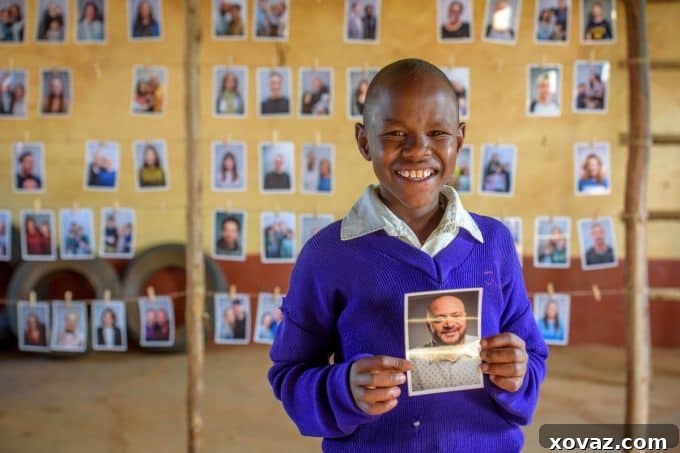 A World Vision sponsored child smiling warmly, having just chosen their new sponsor, symbolizing hope, dignity, and a new beginning.