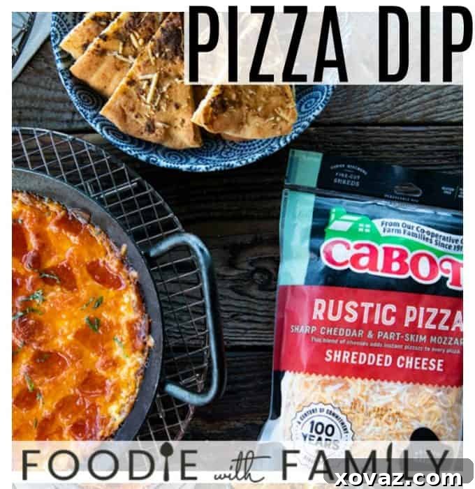 Pizza Dip ready to be served with various dippers