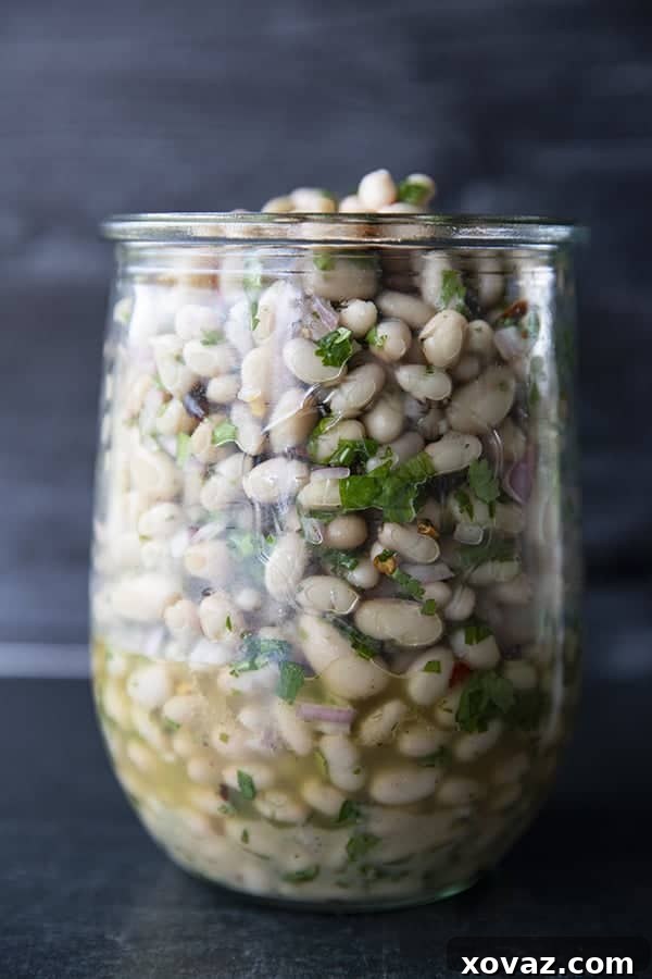 Mediterranean White Bean Salad 3 Full of fresh herb flavors, White Bean Salad comes together in a breeze. Made with canned or home cooked white beans, abundant fresh herbs, and a simple vinaigrette dressing, this salad is delicious as a light lunch on its own or as a side dish with all your favorite entrees.