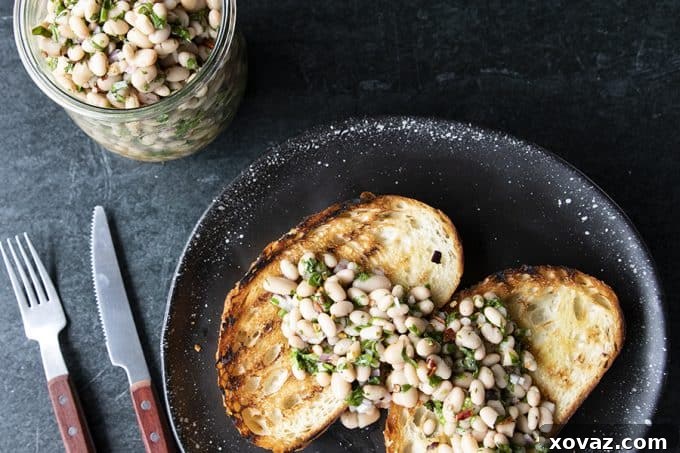 Mediterranean White Bean Salad 4 Full of fresh herb flavors, White Bean Salad comes together in a breeze. Made with canned or home cooked white beans, abundant fresh herbs, and a simple vinaigrette dressing, this salad is delicious as a light lunch on its own or as a side dish with all your favorite entrees.