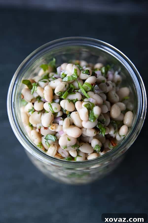 Mediterranean White Bean Salad 5 Full of fresh herb flavors, White Bean Salad comes together in a breeze. Made with canned or home cooked white beans, abundant fresh herbs, and a simple vinaigrette dressing, this salad is delicious as a light lunch on its own or as a side dish with all your favorite entrees.