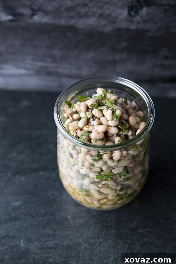 Mediterranean White Bean Salad 7 Full of fresh herb flavors, White Bean Salad comes together in a breeze. Made with canned or home cooked white beans, abundant fresh herbs, and a simple vinaigrette dressing, this salad is delicious as a light lunch on its own or as a side dish with all your favorite entrees.