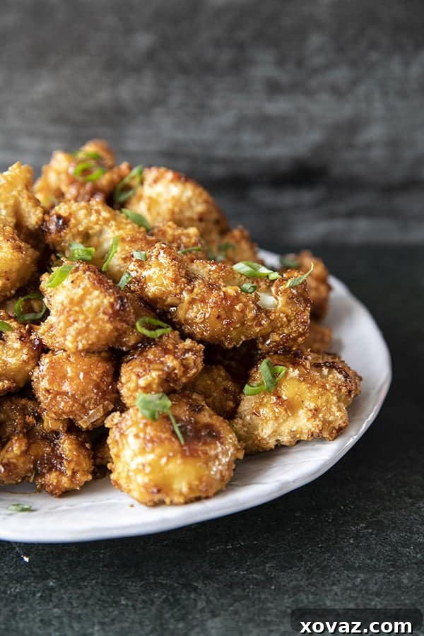 Crispy Cauli Bites 3 These incredible and incredibly simple, crunchy, baked Cauliflower Wings are sublimely sticky courtesy of the flavourful ginger and garlic teriyaki glaze.