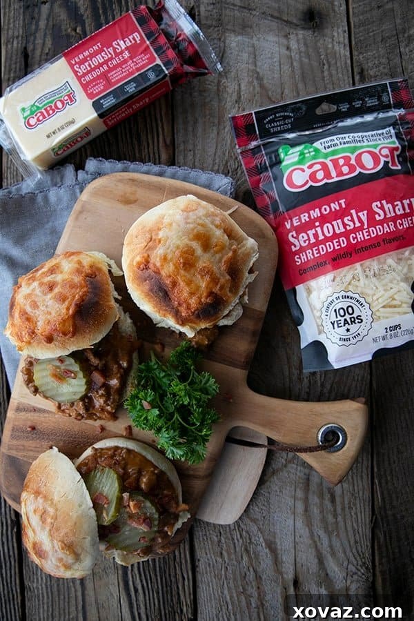 Flavor-Packed Homemade Sloppy Joes 3 A rich tomato gravy featuring generous amounts of melted Cabot cheese and crispy chopped bacon, served on a toasted bun with tangy dill pickles. This dish offers the comforting taste of a bacon cheeseburger with an added layer of homemade warmth.