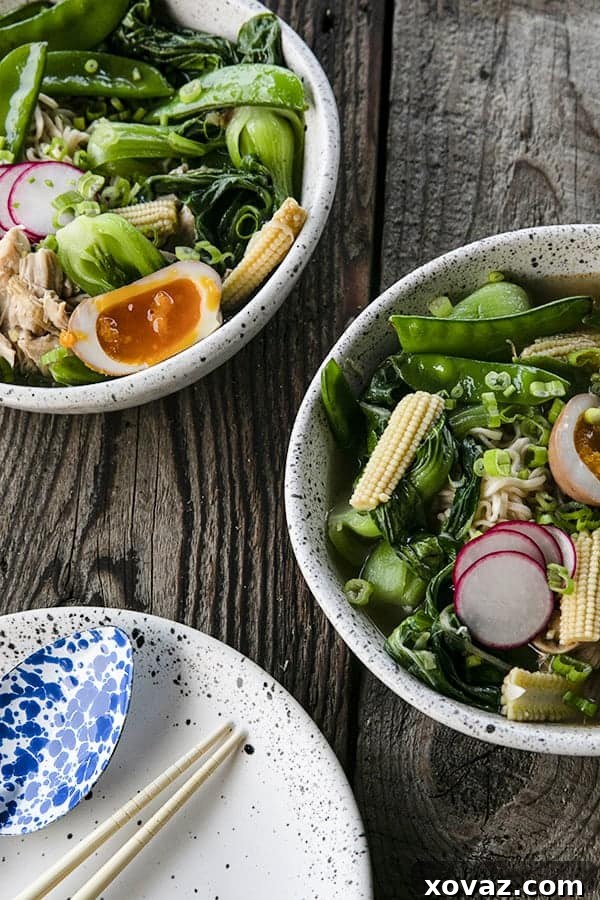 Ultimate Instant Pot Ramen 2 Instant Pot Chicken Ramen with jammy egg, baby corn, pea pods, bok choy, mushrooms, and radishes.