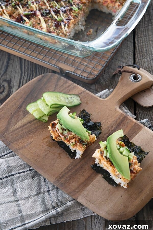 Sushi Bake rice topped with creamy crab layer and sauce serve on toasted nori
