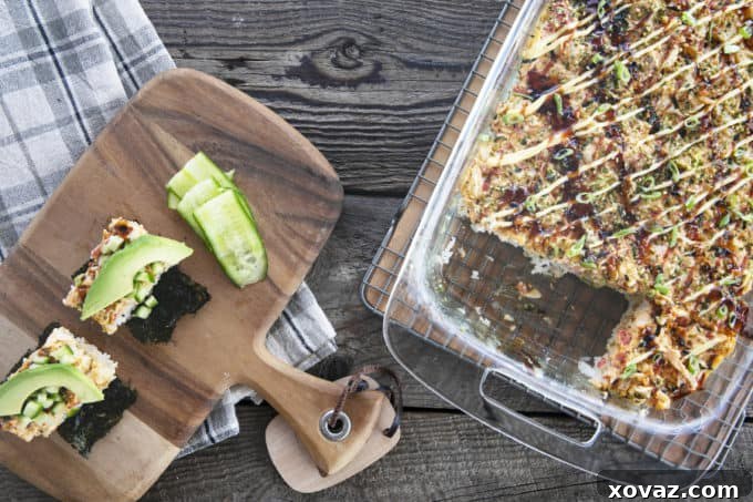 Sushi Bake rice topped with creamy crab layer and sauce serve on toasted nori