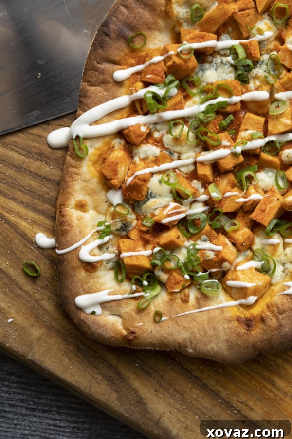 Bold Buffalo Chicken Flatbread 2 Vibrant Buffalo Chicken Flatbread featuring spicy chicken, melted cheese, and fresh green onions, perfect for appetizers or dinner.