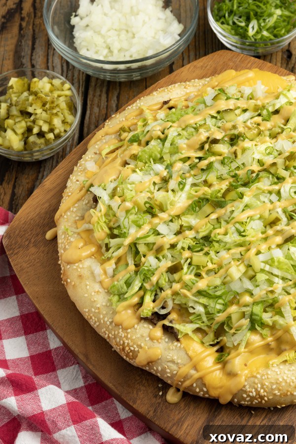 Mac Attack Pizza 2 Delicious homemade Big Mac Pizza with all the classic toppings, ready to be enjoyed