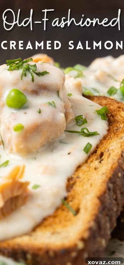 A top-down shot of a large bowl of creamy salmon with peas, ready to be portioned and served for a family meal.