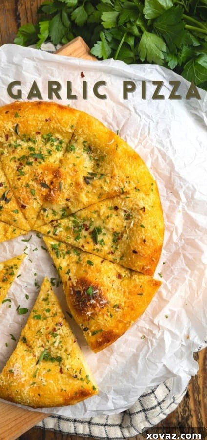 Ultimate Garlic Pizza 7 A close-up of a rustic wooden cutting board with two slices of freshly baked garlic pizza, garnished with fresh herbs, ready to be enjoyed.