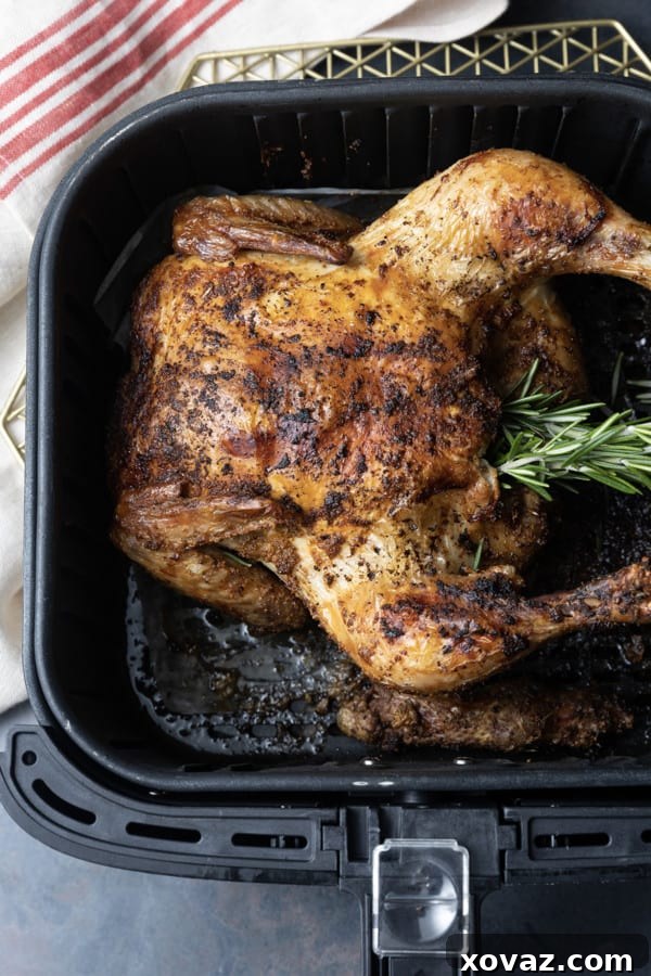 Crispy Air Fryer Whole Chicken 5 Crisp skinned and succulent, this air fryer whole chicken will become a weeknight regular. It is faster than oven roasting and creates a juicy, tender rotisserie style chicken!