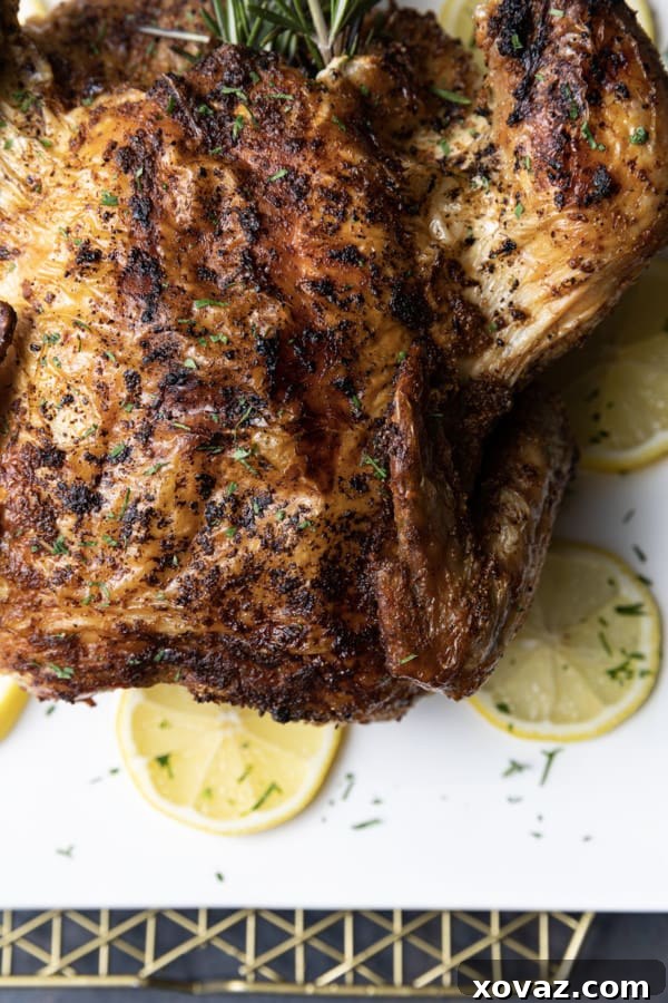 Crispy Air Fryer Whole Chicken 7 Crisp skinned and succulent, this air fryer whole chicken will become a weeknight regular. It is faster than oven roasting and creates a juicy, tender rotisserie style chicken!