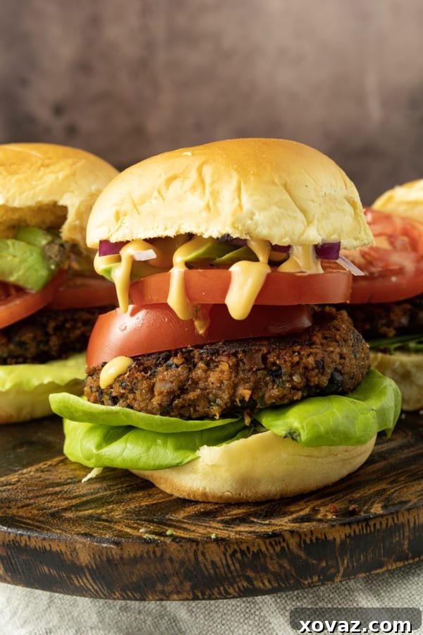 Delicious and hearty Black Bean Quinoa Burgers with excellent texture, served on a bun.