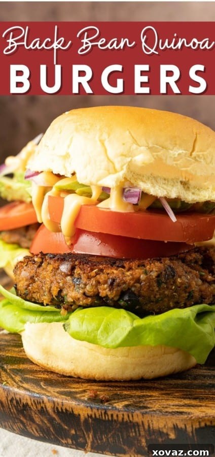 A beautifully composed Black Bean Quinoa Burger with fresh toppings, ready to be enjoyed.