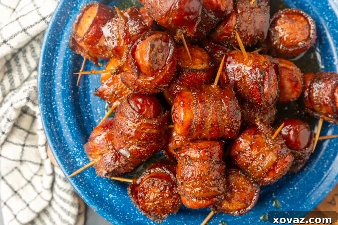 Crispy Air Fryer Kielbasa 3 Close-up of crispy bacon-wrapped kielbasa bites with honey drizzle