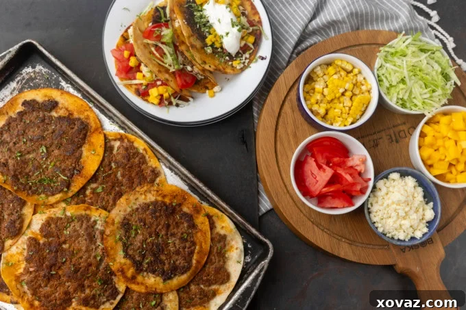 Crispy Smash Tacos 5 A close-up shot of smash tacos sizzling on a griddle, showcasing their crispy edges.