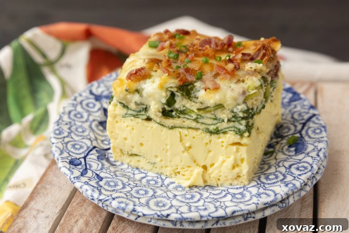 The high protein egg bake baking in the oven, with a golden-brown top and bubbling edges.