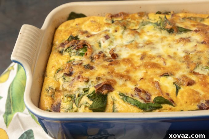 A delicious slice of high protein egg bake with cottage cheese, garnished and ready for breakfast.