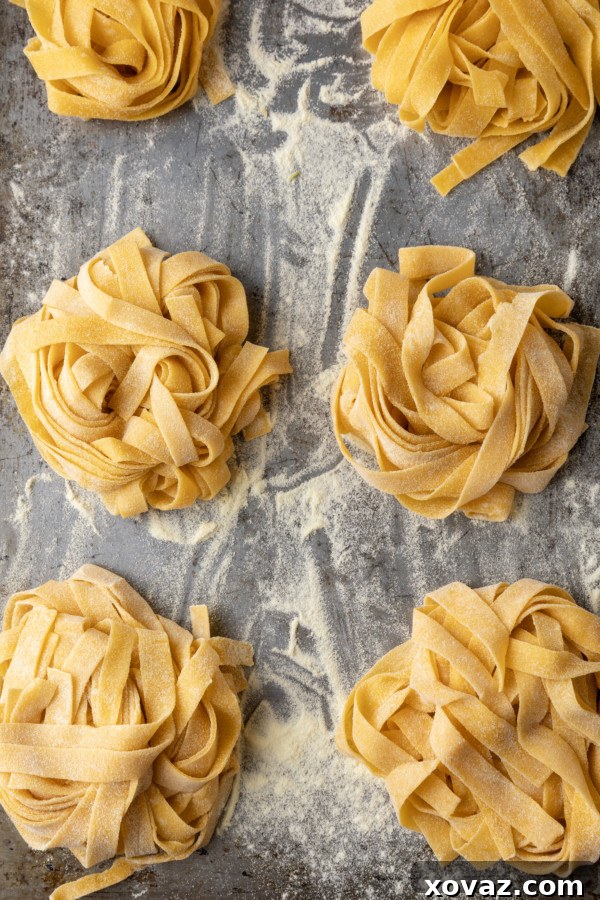 Mastering Fresh Pasta from Scratch 17 A bowl of freshly cooked pasta with sauce.