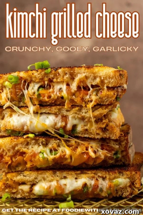 Stacked kimchi grilled cheese sandwiches with melted cheese pulling apart, text overlay describes the deliciousness.