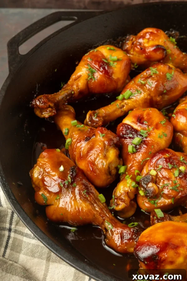 Honey-Glazed Garlic Chicken 5 baked honey garlic chicken in a cast-iron pan