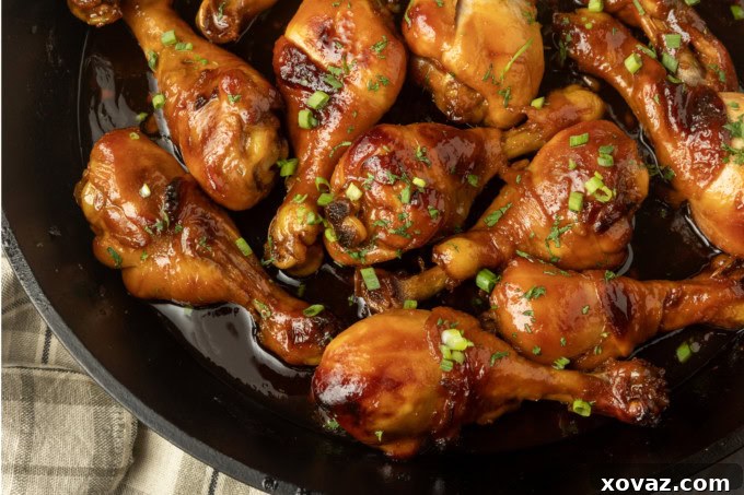 Honey-Glazed Garlic Chicken 8 baked honey garlic chicken in a cast-iron pan
