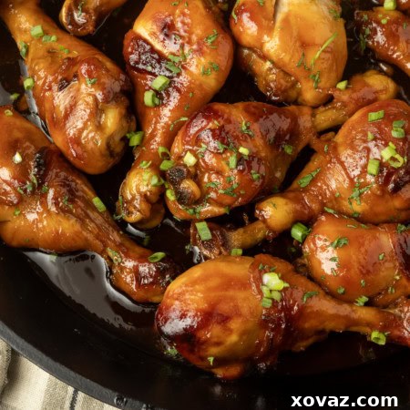 Honey-Glazed Garlic Chicken 7 baked honey garlic chicken in a cast-iron pan