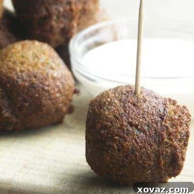 Balls of fried falafel with a tahini sauce