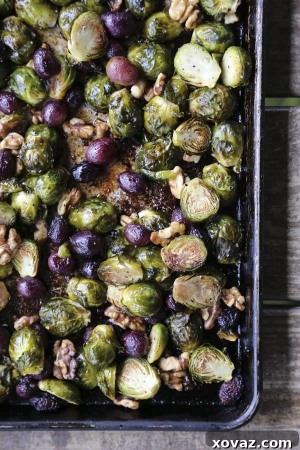 Close-up of fresh Brussels Sprouts, vibrant grapes, and walnuts ready for roasting, from foodiewithfamily.com