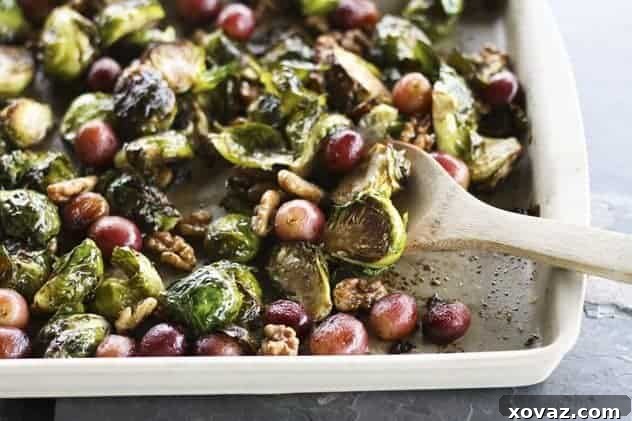 Close-up of the delicious roasted Brussels sprouts with grapes and walnuts dish