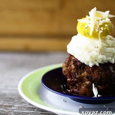 Bacon Cheeseburger Mini-Meatloaves and Cheesy Mashed Potatoes, ready to be served.