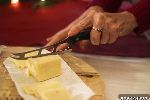 Rogue Creamery Rosemary Touvelle Cheese at a party table, a gourmet touch